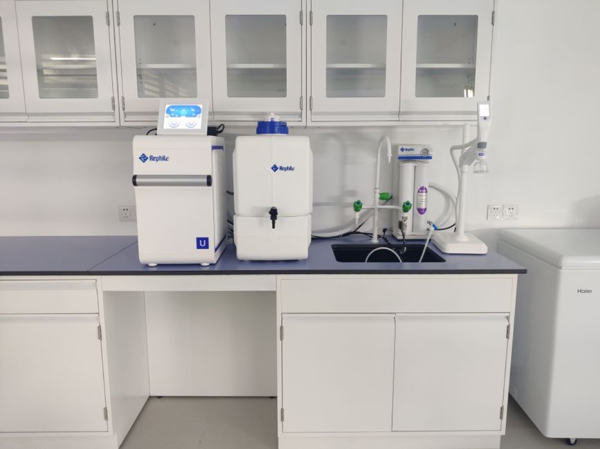 Under-sink reverse osmosis water filtration system installed in kitchen cabinet