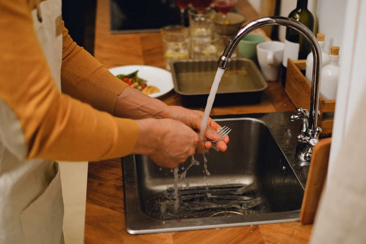 Clean kitchen counter with filtered water glass